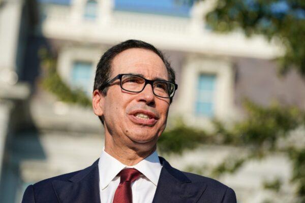 Secretary of the Treasury Steven Mnuchin answers questions from the press after an interview on CNBC on the North Lawn of the White House in Washington, on Sept. 12, 2019. (Sarah Silbiger/Reuters)