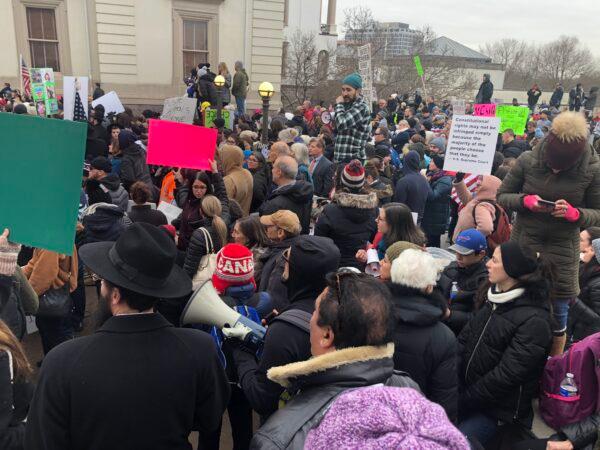 Protesters against a bill that would end religious exemptions for vaccines stand outside the New Jersey State House in Trenton, N.J. on Jan. 13, 2020. (Celia Farber/The Epoch Times)