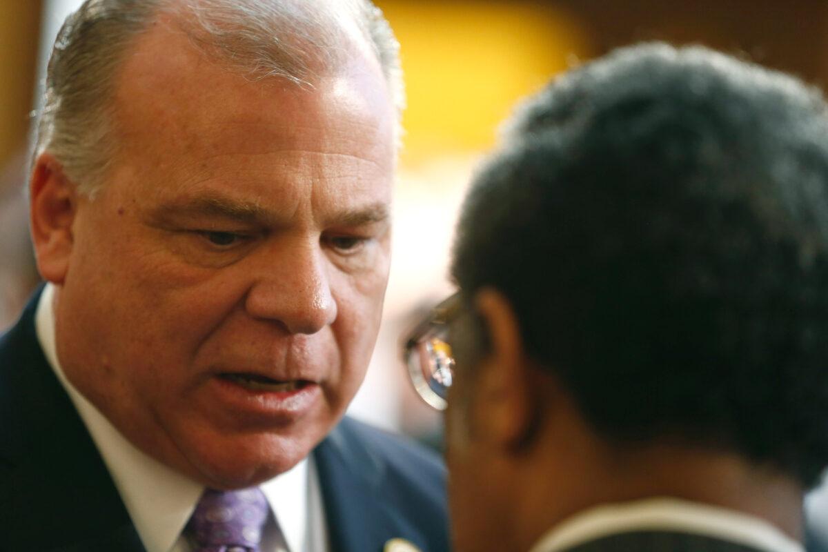 New Jersey Senate President Steve Sweeney speaks to a colleague at the State House in Trenton, N.J. on Feb. 24, 2015. (Jeff Zelevansky/Getty Images)