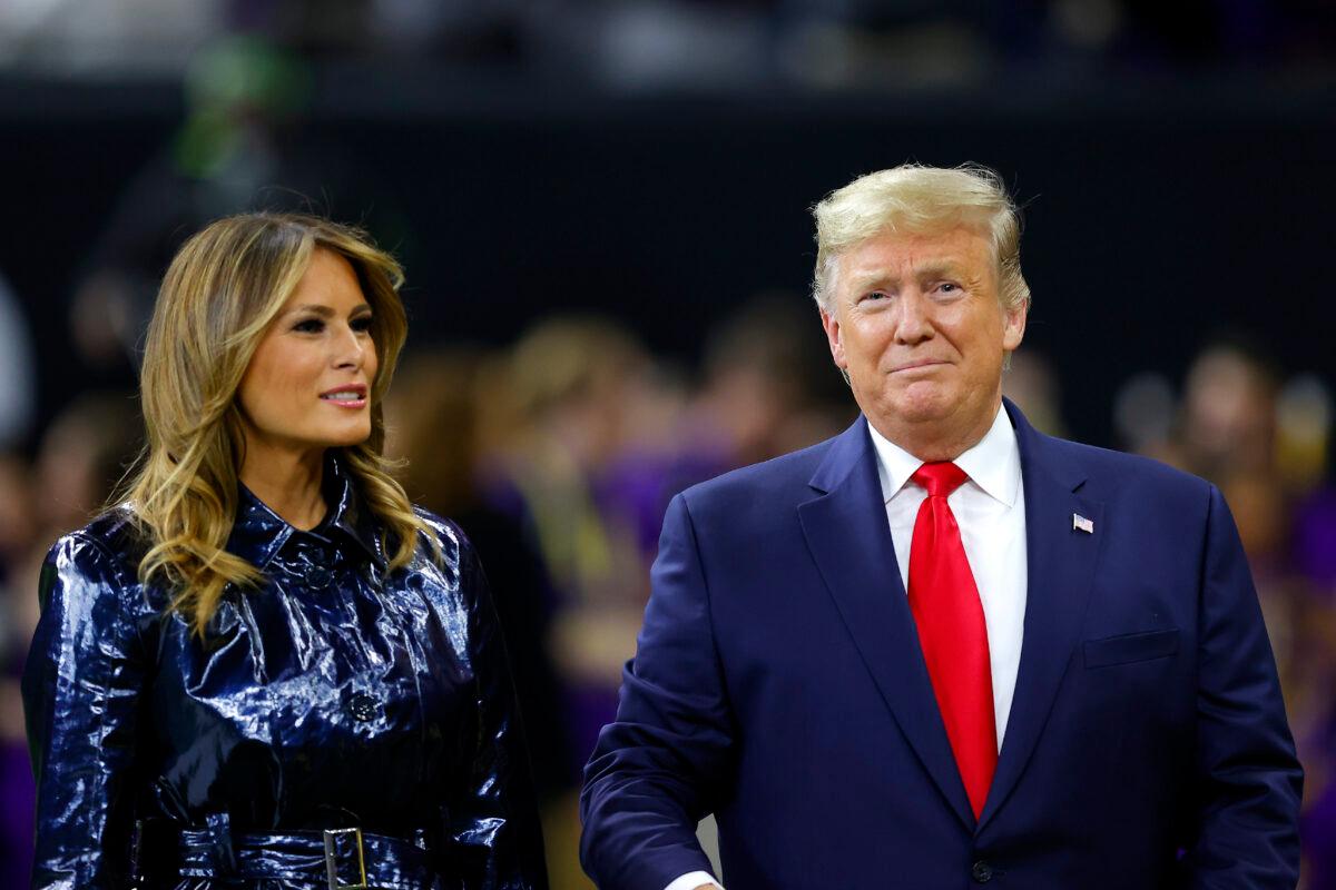 First Lady Melania Trump and President Donald Trump smile prior to the College Football Playoff National Championship game between the Clemson Tigers and the LSU Tigers at Mercedes Benz Superdome in New Orleans, Louisiana on Jan. 13, 2020. (Kevin C. Cox/Getty Images)