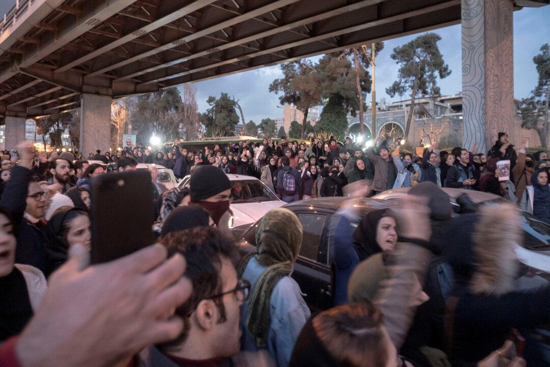Unprecedented Iran Protests Target Islamic Regime, Experts Say