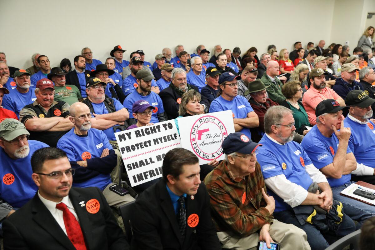 Second Amendment advocates attend a hearing where four gun control bills passed the Senate Judiciary Committee at the Virginia State Capitol in Richmond, Va., on Jan. 13, 2020. (Samira Bouaou/The Epoch Times)
