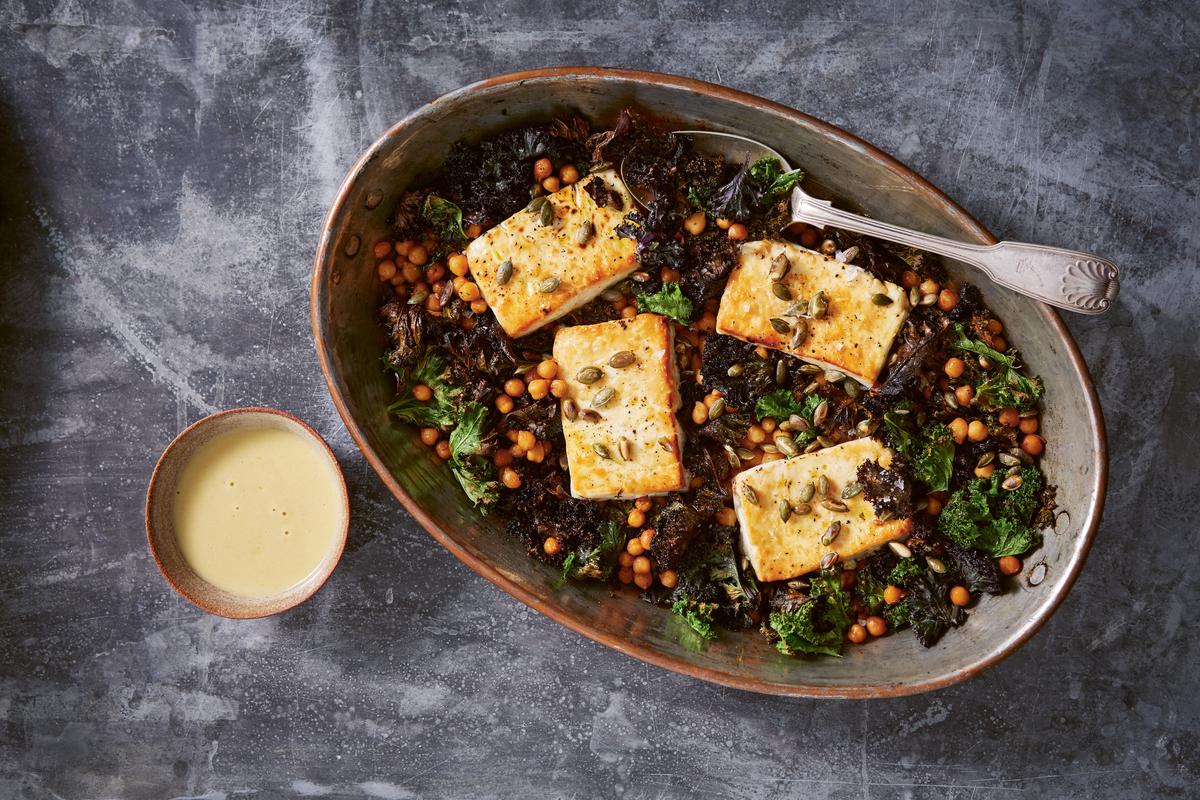 Baked Feta With Greens and Lemon-Tahini Dressing