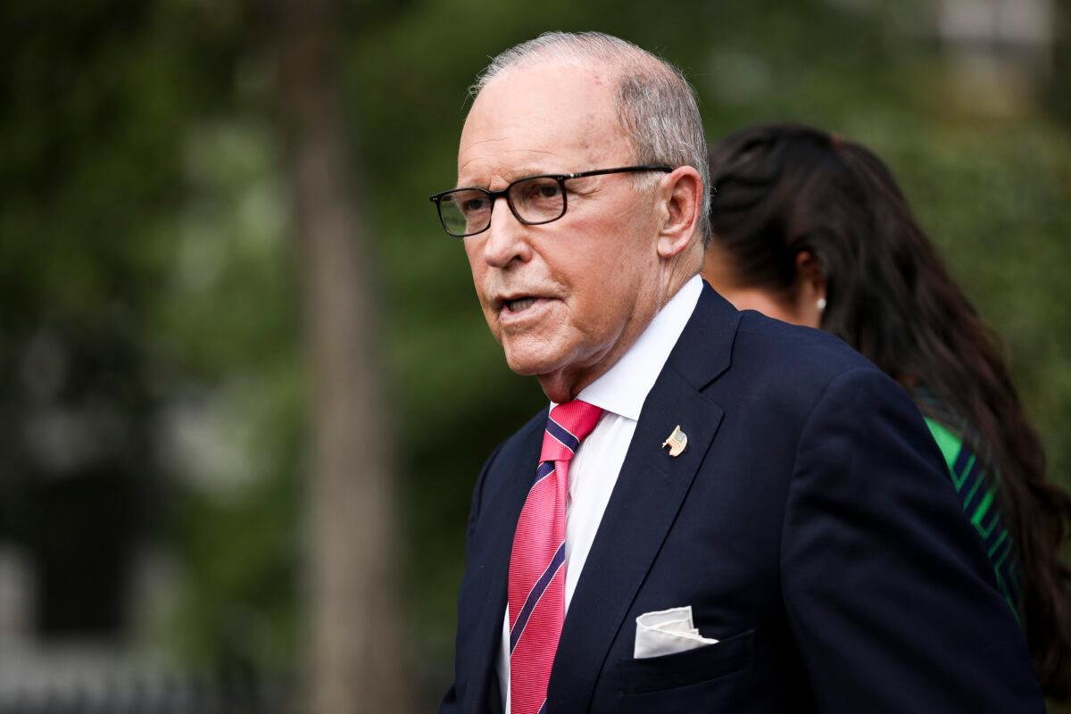 White House economic adviser Larry Kudlow talks to media outside the White House in Washington in a Sept. 26, 2019, file photograph. (Charlotte Cuthbertson/The Epoch Times)