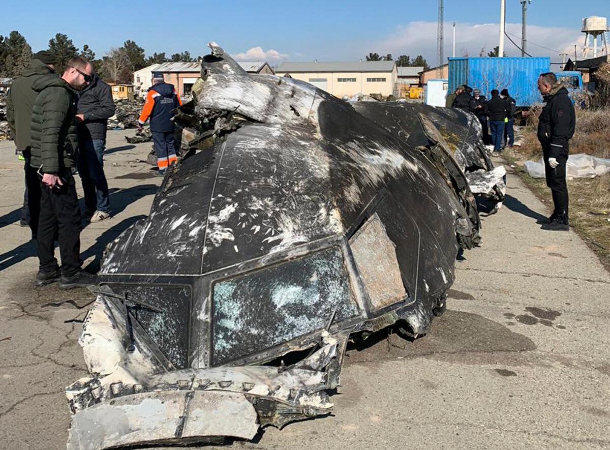 This undated photo shows wreckage from the Ukraine International Airlines Boeing 737-800 at the scene of the crash in Shahedshahr, southwest of the capital Tehran, Iran. (Ukrainian Presidential Press Office via AP)
