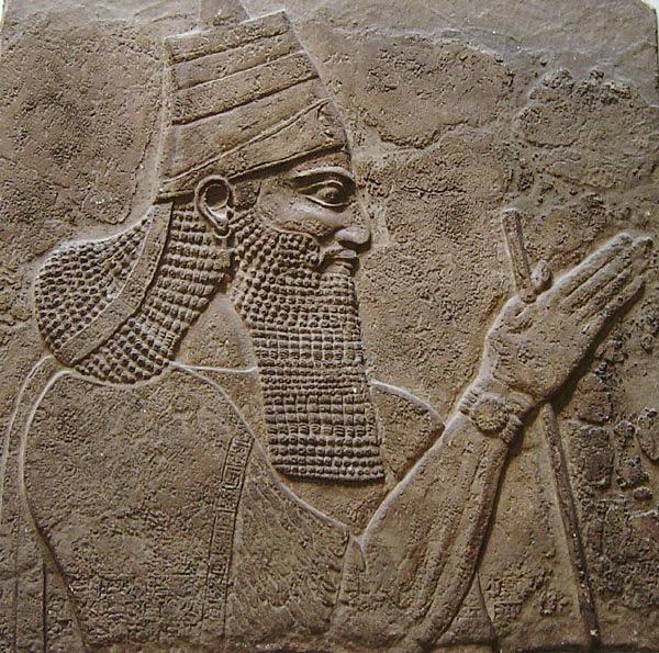 A stone tablet depicting Tiglath-Pileser III, the Assyrian king with a mighty army. (Public Domain)
