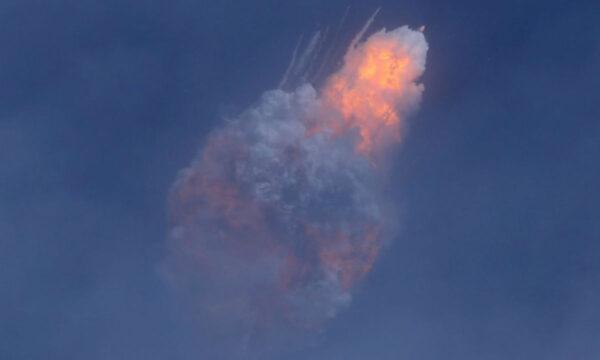 A SpaceX Falcon 9 rocket engine intentionally self-destructs after jettisoning the Crew Dragon astronaut capsule shortly after takeoff at the Kennedy Space Center in Cape Canaveral, Fla, on Jan. 19, 2020. (Joe Rimkus Jr/Reuters)