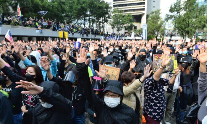 Hong Kong Police Break Up Pro-Democracy Singing Protest at Mall