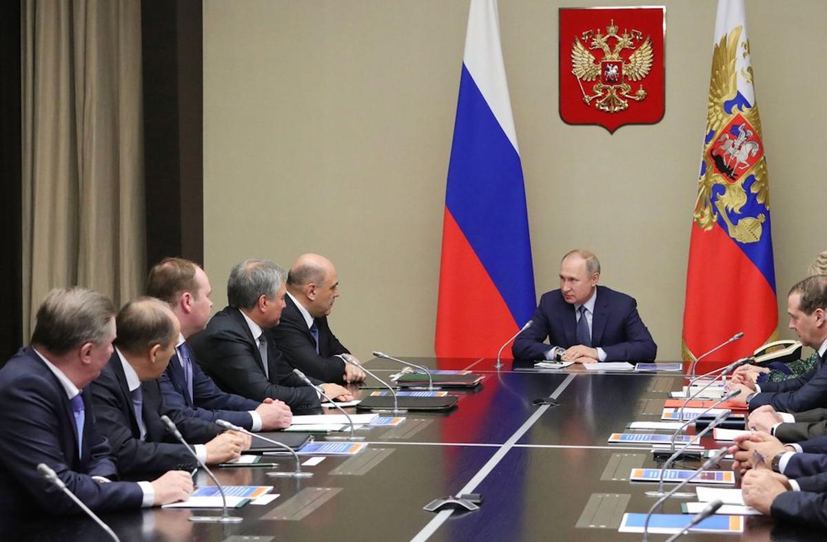 Russian President Vladimir Putin, center, chairs a Security Council meeting at the Novo-Ogaryovo residence outside Moscow in Moscow, Russia, on Jan. 20, 2020. (Mikhail Klimentyev, Sputnik, Kremlin Pool Photo via AP)
