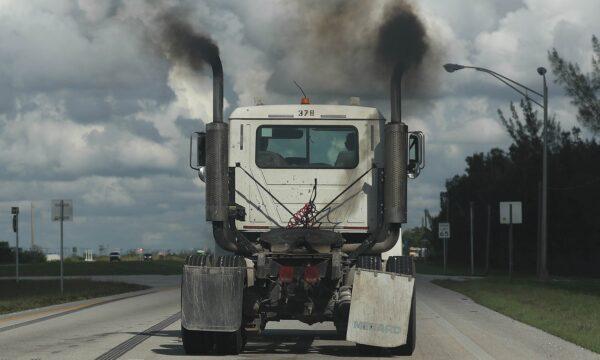 Smoke pours from the exhaust pipes on a truck in Miami, Florida, on Nov. 5, 2019. (Joe Raedle/Getty Images)