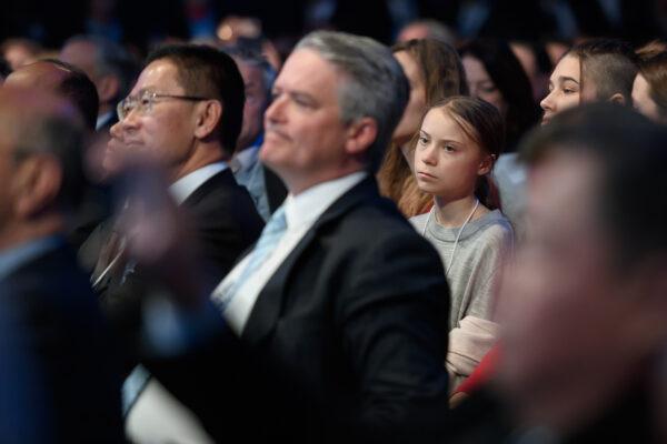 Swedish climate activist Greta Thunberg listens to the speech of US President Donald Trump during the World Economic Forum (WEF) annual meeting in Davos, on Jan. 21, 2020. (FABRICE COFFRINI/AFP via Getty Images)