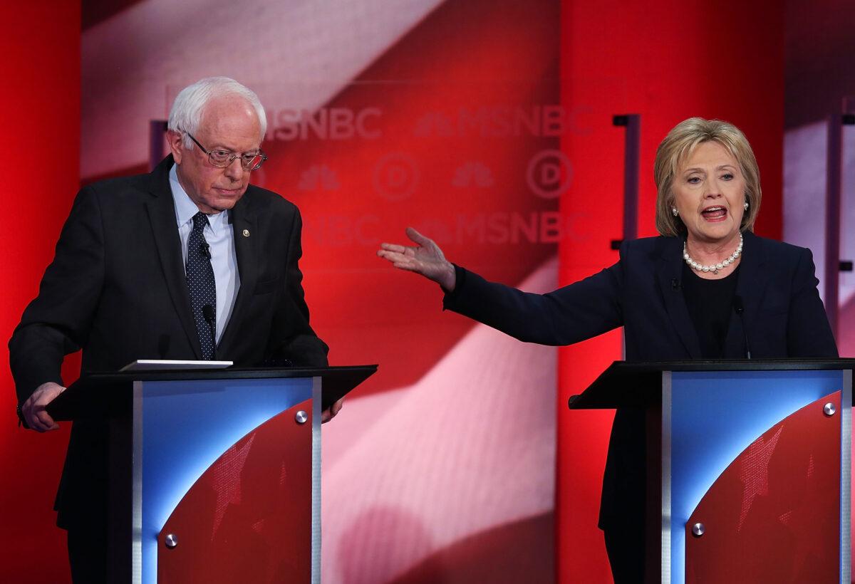 Democratic presidential candidates former Secretary of State Hillary Clinton and Sen. Bernie Sanders (I-Vt.) during a debate at the University of New Hampshire in Durham, New Hampshire, on Feb. 4, 2016. (Justin Sullivan/Getty Images)