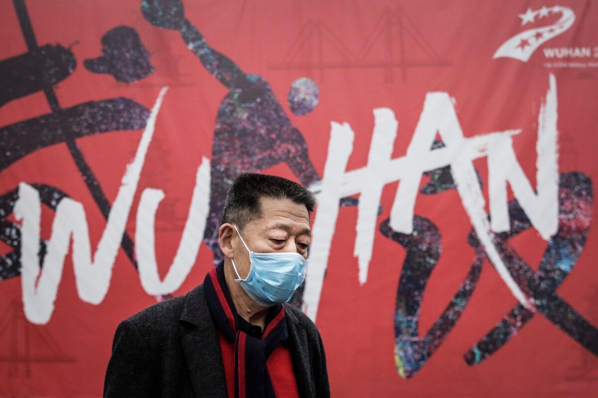  A man wears a mask while walking in the street in Wuhan, China, on Jan. 22, 2020. (Getty Images)