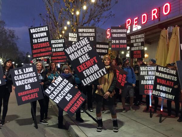 Protesters rally against new laws regarding medical exemptions to vaccination in California, in San Pedro Square Market in San Jose, Calif., on Jan. 11, 2020. (Ilene Eng/The Epoch Times)