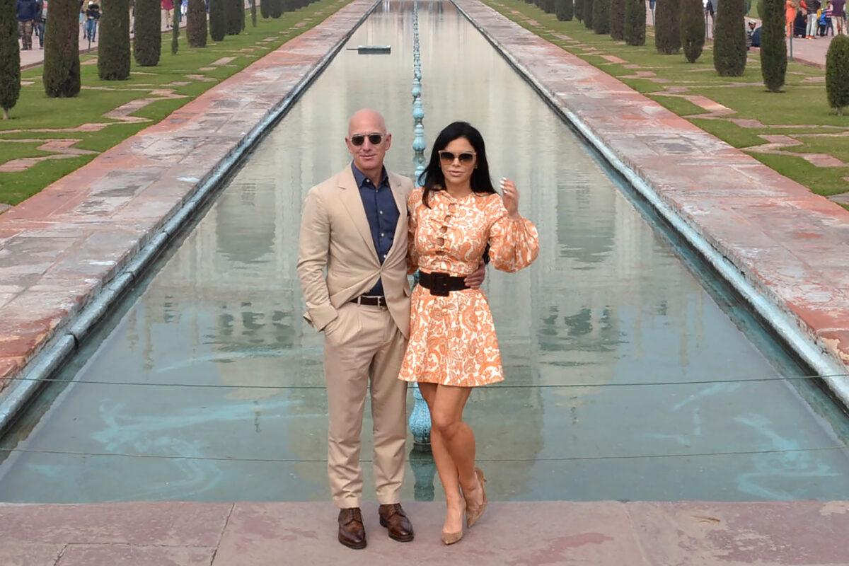 Chief Executive Officer of Amazon Jeff Bezos (L) and his girlfriend Lauren Sanchez pose for a picture during their visit at the Taj Mahal in Agra on Jan. 21, 2020. (Pawan Sharma/AFP via Getty Images)