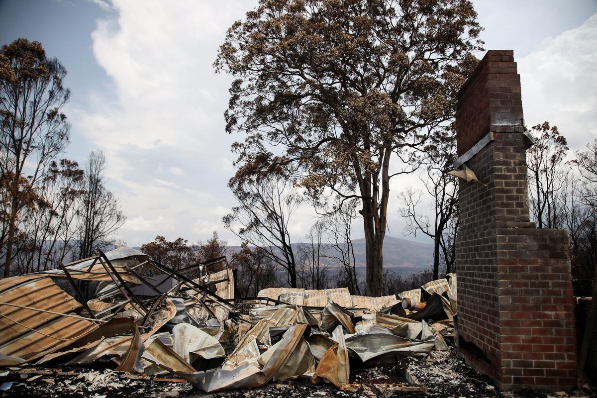 Rubble is seen at a property damaged by bushfires in Kangaroo Valley, Australia, Jan. 20, 2020. (Reuters/Angie Teo)