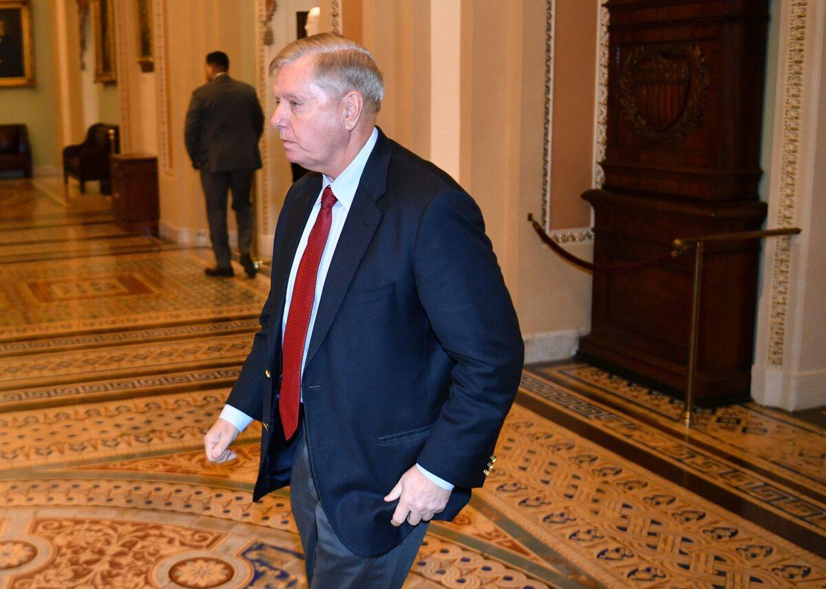 Sen. Lindsey Graham (R-S.C.) arrives for the Senate impeachment trial of President Donald Trump in Washington on Jan. 21, 2020. (Mandel Ngan/AFP via Getty Images)