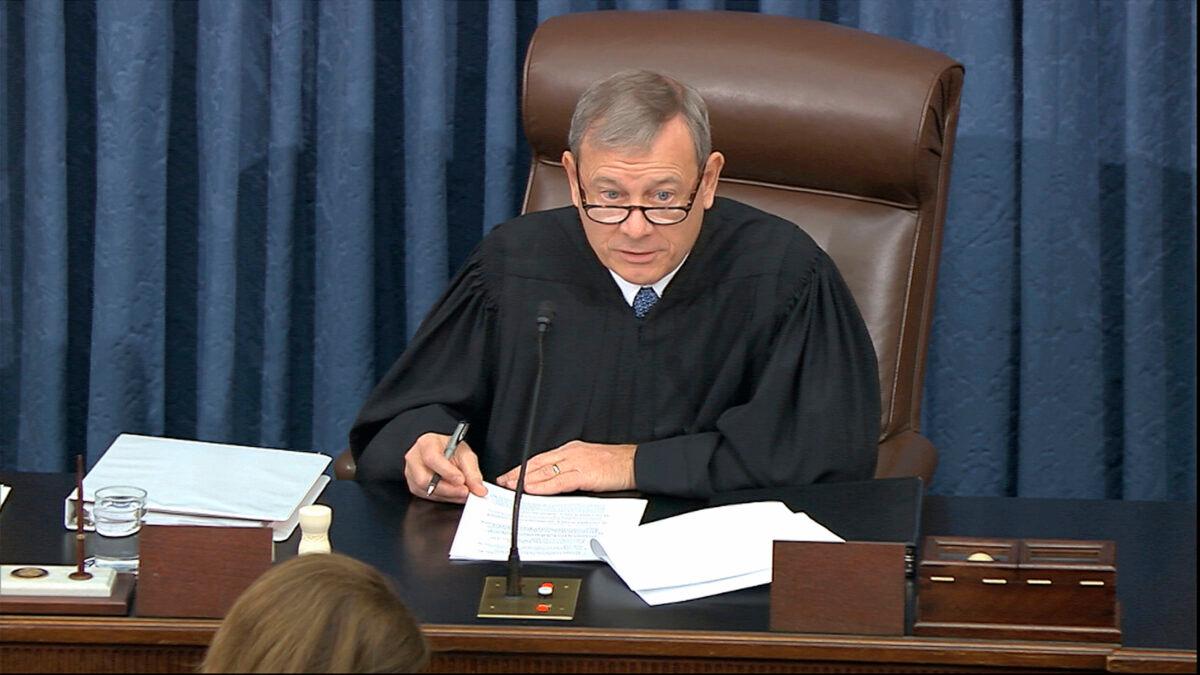 In this image from video, presiding officer Supreme Court Chief Justice John Roberts speaks during the impeachment trial against President Donald Trump in the Senate at the U.S. Capitol in Washington, on Jan. 21, 2020. (Senate Television via AP)