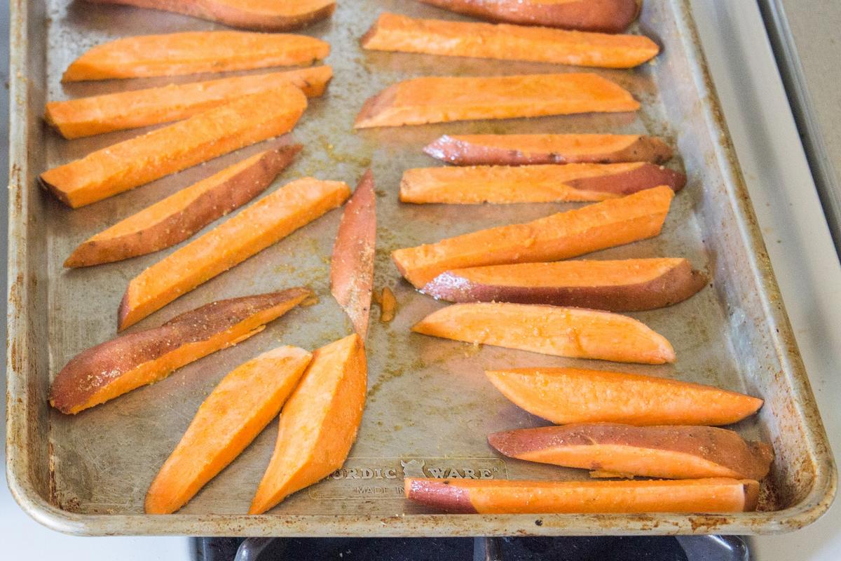 Thick-cut sweet potato fries, ready for the oven. (Caroline Chambers)