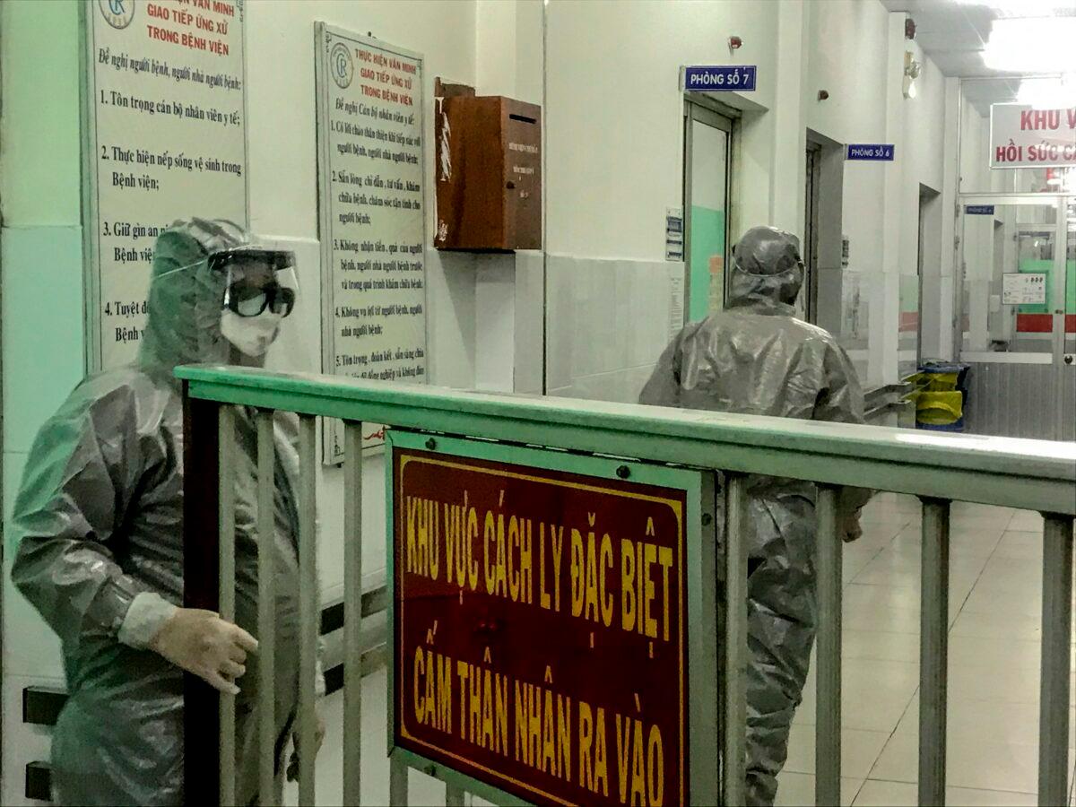 Medical workers enter an isolation area to visit the first two cases of the new coronavirus infection, in Cho Ray hospital in Ho Chi Minh City on Jan. 23, 2020. (Bach Duong/AFP via Getty Images)