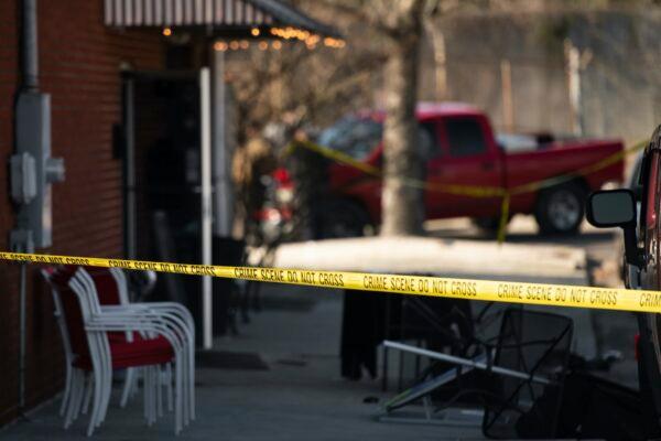 Crime scene tape stretches in front of Mac's Lounge, the scene of an early morning bar shooting, in Hartsville, S.C., on Jan. 26, 2020. (Sean Rayford/AP Photo)