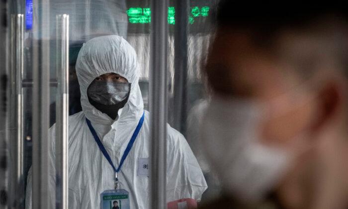 Panic Stirs in Chinese City Where Deadly Virus Broke Out