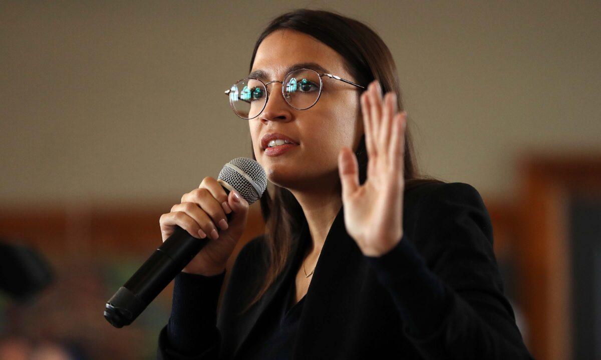Rep. Alexandria Ocasio-Cortez (D-N.Y.) speaks during a campaign event with Democratic presidential candidate Sen. Bernie Sanders (I-Vt.) at La Poste in Perry, Iowa, on Jan. 26, 2020. (Chip Somodevilla/Getty Images)