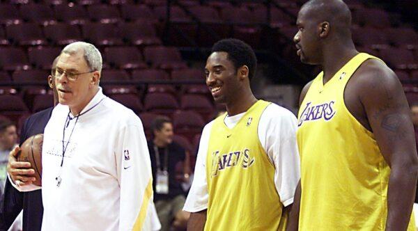 Kobe Bryant (C) and Shaquille O'Neal (R) listen to former Lakers head coach Phil Jackson (L) in a file photo (JEFF HAYNES/AFP via Getty Images)