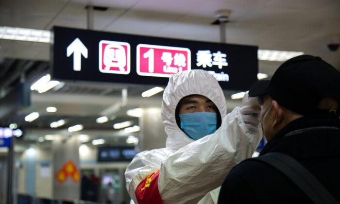 Beijing Extends New Year Holiday as Conoravirus Death Toll Continues to Rise
