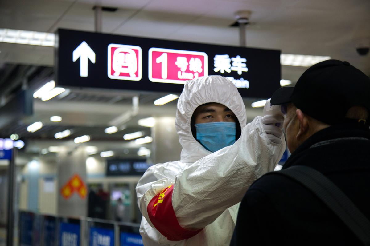 Beijing Extends New Year Holiday as Conoravirus Death Toll Continues to Rise