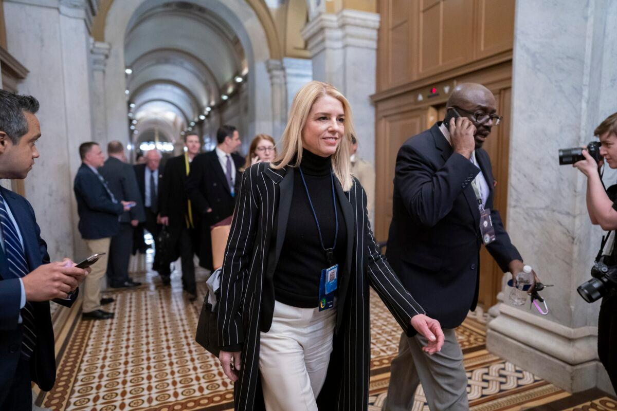 Pam Bondi, a White House adviser and member of the legal team, departs the Senate following opening arguments by the Republicans in the impeachment trial of President Donald Trump at the Capitol in Washington on Jan. 25, 2020. (J. Scott Applewhite/AP Photo)