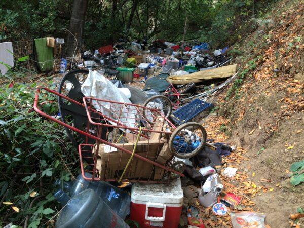 Waste from a homeless encampment along San Lorenzo Creek in Castro Valley, Calif. Local residents are paying the bill to clean it up after authorities cleared out the camp's inhabitants. (Courtesy of Alameda County)