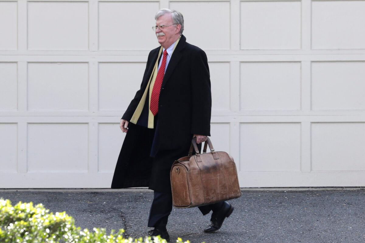 Former national security adviser John Bolton leaves his home in Bethesda, Md., on Jan. 28, 2020. (Luis M. Alvarez/AP Photo)
