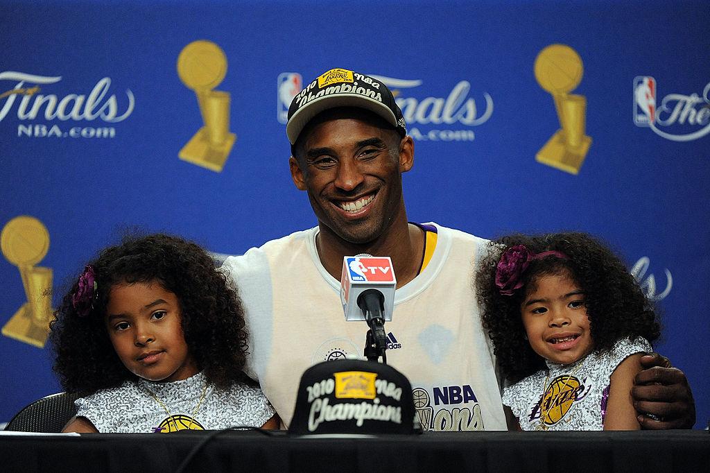 Kobe Bryant and daughters Natalia and Gianna Bryant at the 2010 NBA Finals. (©Getty Images | <a href="https://www.gettyimages.com/detail/news-photo/kobe-bryant-of-the-los-angeles-lakers-speaks-during-the-news-photo/102187223?adppopup=true">Lisa Blumenfeld</a>)