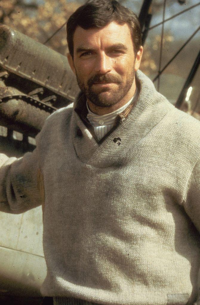 Selleck playing the heroic lead in the Brian G. Hutton film 'High Road to China,' circa 1983 (©<a href="https://www.gettyimages.com/detail/news-photo/moustachioed-actor-tom-selleck-plays-the-heroic-lead-in-the-news-photo/3142143?adppopup=true">Getty Images</a>)