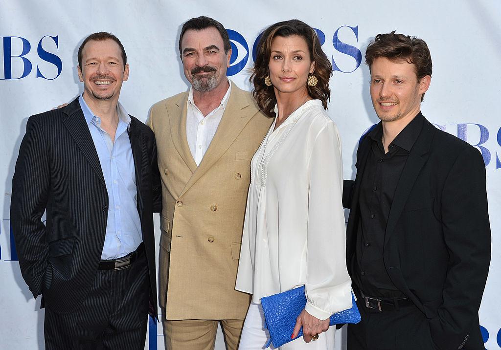 Singer Donnie Wahlberg, Tom Selleck, Bridget Moynahan, and Will Estes of "Blue Bloods" at Leonard H. Goldenson Theater in North Hollywood on June 5, 2012 (©Getty Images | <a href="https://www.gettyimages.com/detail/news-photo/actors-donnie-wahlberg-tom-selleck-bridget-moynahan-and-news-photo/145778475?adppopup=true">Alberto E. Rodriguez</a>)