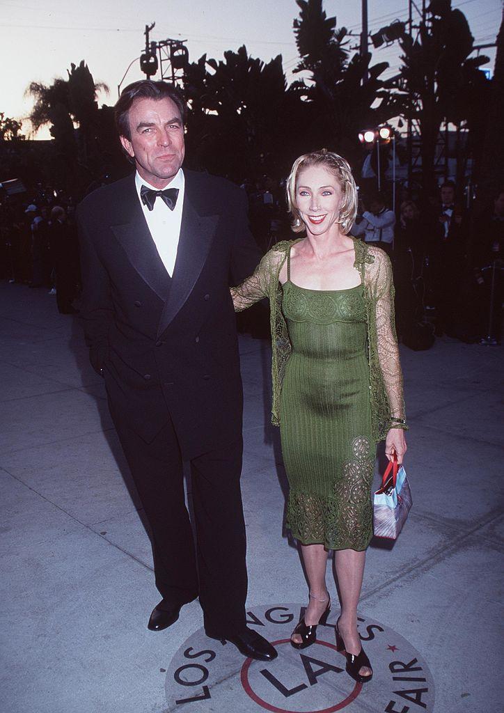 Selleck with his wife, Jillie Mack, arriving at the Vanity Fair Oscar Party at Mortons Restaurant in West Hollywood on March 21, 1999 (©Getty Images | <a href="https://www.gettyimages.com/detail/news-photo/los-angeles-tom-selleck-with-wife-jillie-mack-arriving-at-news-photo/853023?adppopup=true">Brenda Chase</a>)