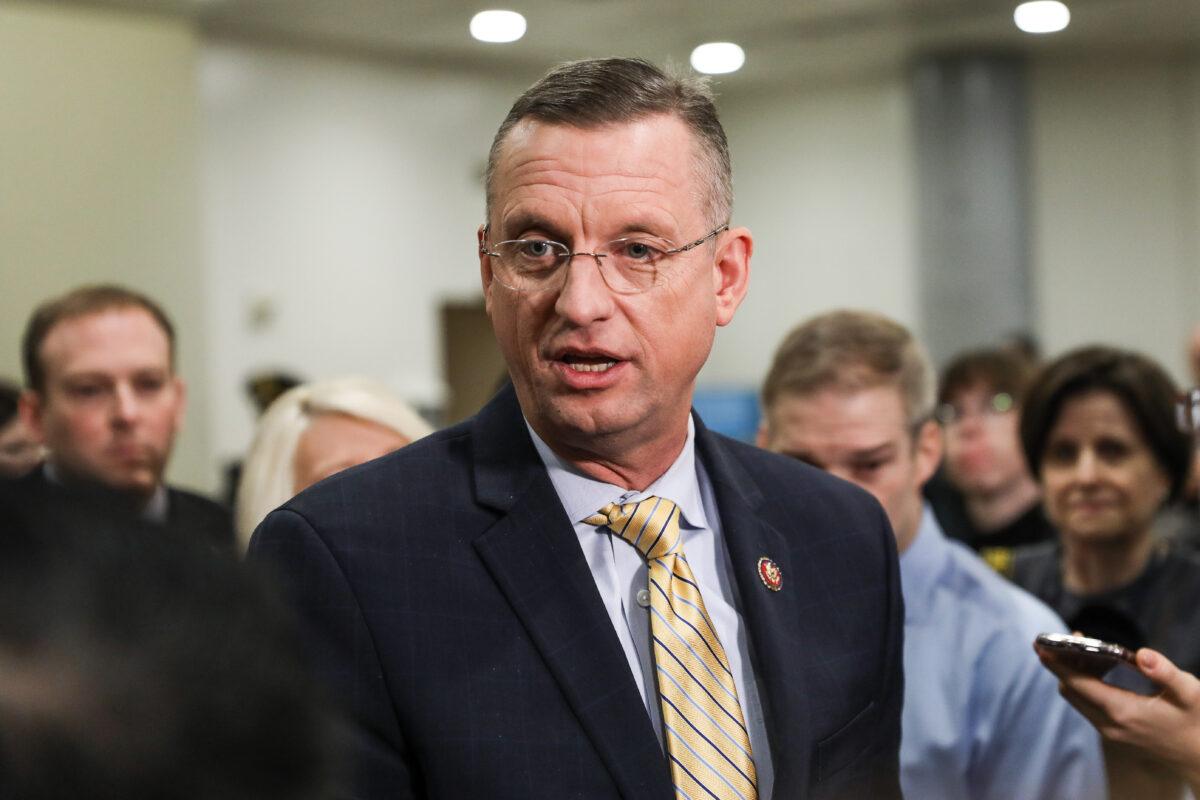 Rep. Doug Collins (R-Ga.) speaks to media while other impeachment defense team advisors look on, at the Capitol in Washington on Jan. 27, 2020. (Charlotte Cuthbertson/The Epoch Times)