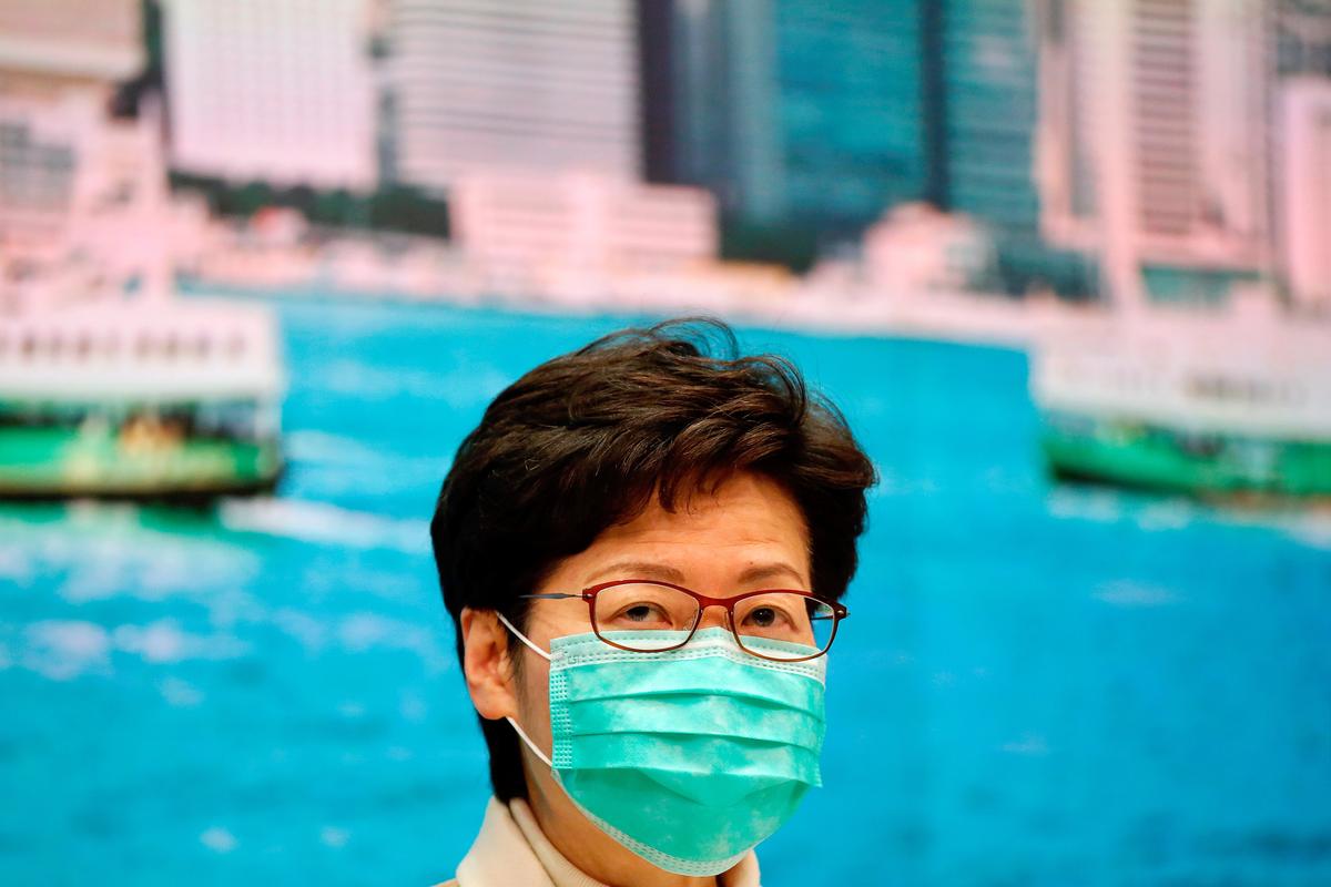 Hong Kong Leader Rejects Calls to Close Border Despite Virus Fears
