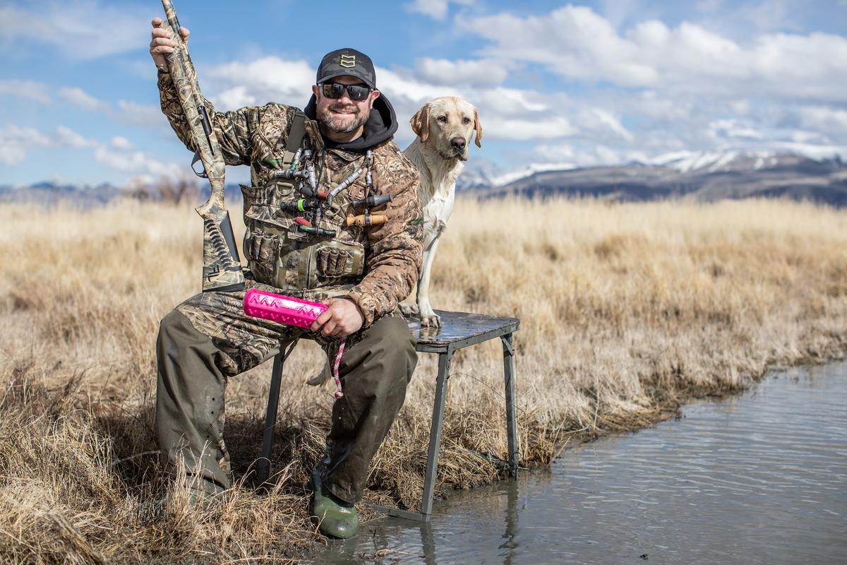 Chad Belding with his hunting dog. (Tom Rassuchine/The Fowl Life)