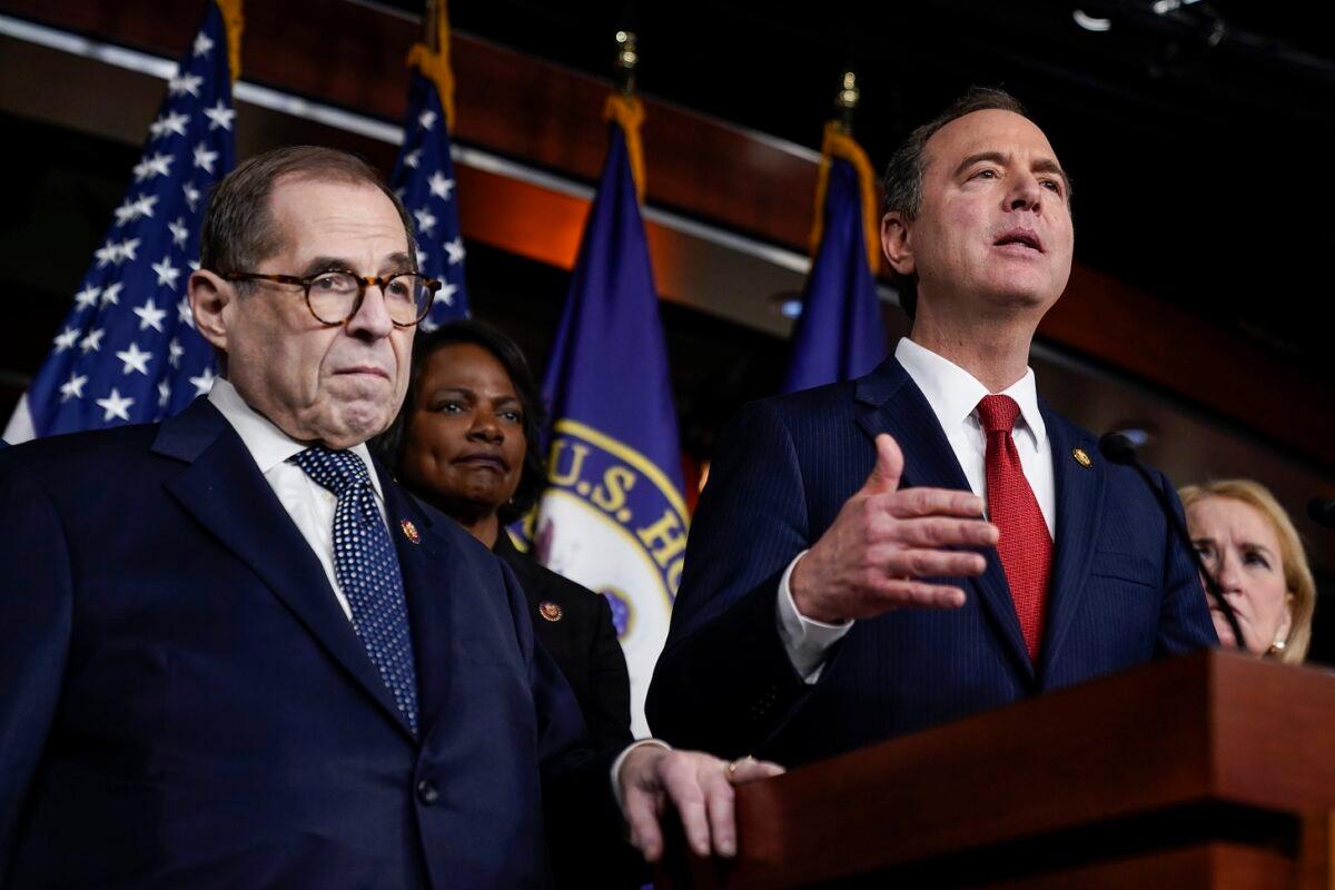 (L-R) House impeachment managers Rep. Jerry Nadler (D-N.Y.) and Rep. Val Demmings (D-Fla.) look on as Rep. Adam Schiff (D-Calif.) speaks during a press conference in Washington on Jan. 28, 2020. (Drew Angerer/Getty Images)
