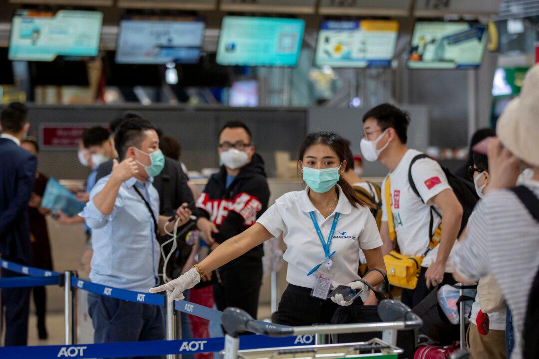 Rest of the World Will Pay the Price for China’s Abrupt Removal of International Travel Restrictions: Author