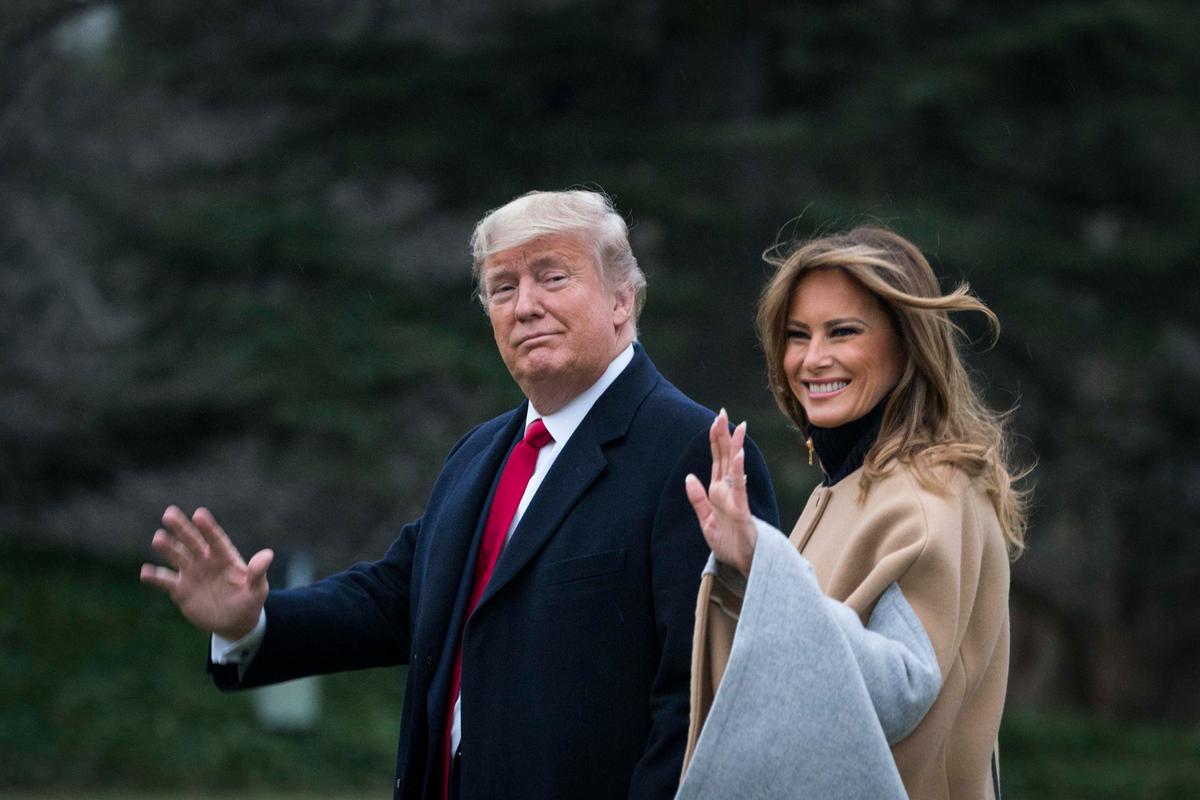 President Donald Trump and First Lady Melania Trump walk along the South Lawn to Marine One as they depart from the White House for a weekend trip to Mar-a-Lago in Washington on Jan. 31, 2020. (Sarah Silbiger/Getty Images)