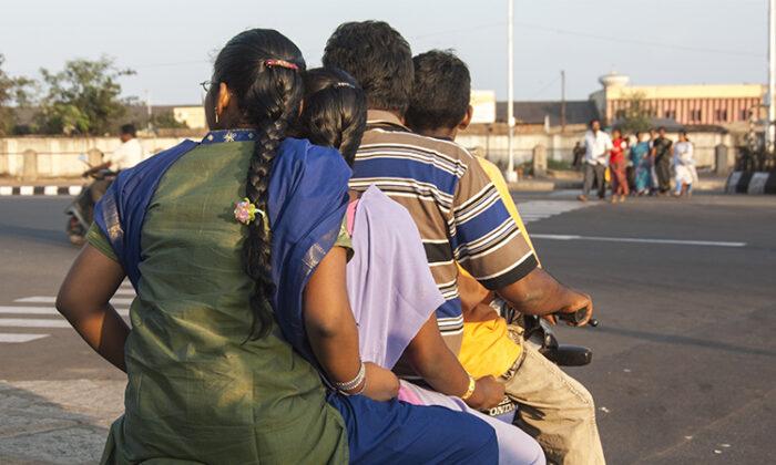 Traffic Cop Pleads Scooter Rider, Who’s Carrying 4 People, to Take Safety Seriously