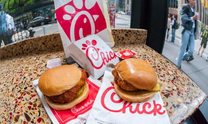 Chick-Fil-A Employee Sits Outside on the Median Strip With Homeless Man, Sharing a Meal