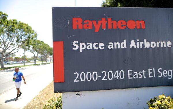 A sign is posted at a Raytheon Co. campus in El Segundo, Calif., on June 10, 2019. (Mario Tama/Getty Images)