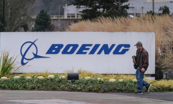 A worker leaves the Boeing 737 factory on December 16, 2019, in Renton, Washington. (Stephen Brashear/Getty Images)