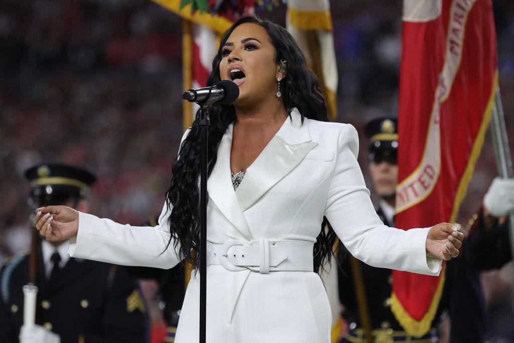 Singer Demi Lovato performs the national anthem prior to Super Bowl LIV.  (©Getty Images | <a href="https://www.gettyimages.com/detail/news-photo/singer-demi-lovato-performs-the-national-anthem-prior-to-news-photo/1203637142?adppopup=true">Tom Pennington</a>)