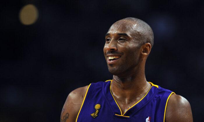 Kobe Bryant at Game 6 of the 2008 NBA Finals in Boston (©Getty Images | <a href="https://www.gettyimages.com/detail/news-photo/los-angeles-lakers-kobe-bryant-reacts-during-the-game-6-of-news-photo/81609466?adppopup=true">GABRIEL BOUYS</a>)