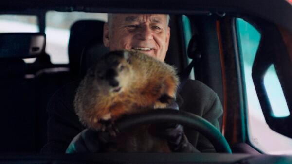 Bill Murray reprises his role as Phil Connors from the 1993 film “Groundhog Day,” in a scene from Jeep's 2020 Super Bowl NFL football spot. (Jeep via AP)